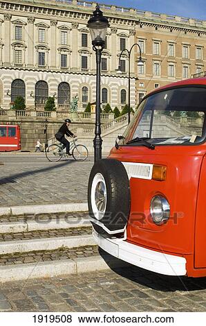 Cyclist Passing Royal Palace Located On Stadsholmen (City Island) In Gamla Stan (Old Town), Stockholm, Sweden View Large Photo Image Stock Photo - Cyclist Passing Royal Palace Located On Stadsholmen (City Island) In Gamla Stan (Old Town), Stockholm, Sweden. Fotosearch