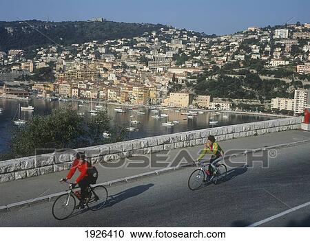 Cyclists By Waterfront View Large Photo Image Stock Image - Cyclists By Waterfront. Fotosearch