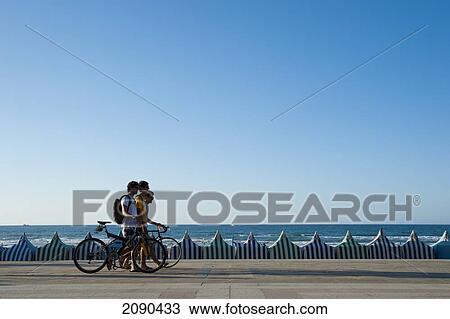Cyclists On The Promenade, Zarautz, Basque Country, Spain View Large Photo Image Stock Image - Cyclists On The Promenade, Zarautz, Basque Country, Spain. Fotosearch