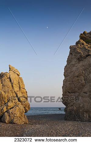 Cyprus, Aphrodite Bay, Large rock formations on coastline View Large Photo Image Stock Image - Cyprus, Aphrodite Bay, Large rock formations on coastline. Fotosearch