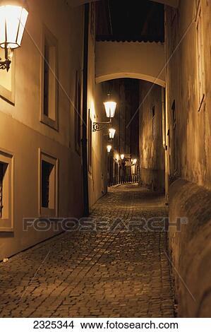 Czech Republic, Alley illuminated by lights at night; Prague View Large Photo Image Picture - Czech Republic, Alley illuminated by lights at night; Prague. Fotosearch