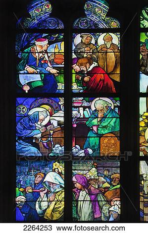 Stock Image - Czech Republic, Stained glass window at St Vitus Cathedral; Prague. Fotosearch