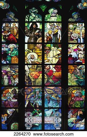 Stock Image - Czech Republic, Stained glass window at St Vitus Cathedral; Prague. Fotosearch