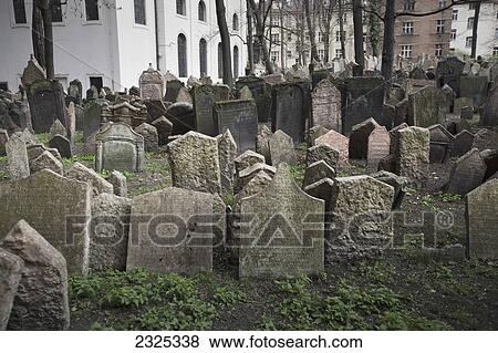 Stock Photo - Czech Republic, Tombstones in old cemetery; Prague. Fotosearch
