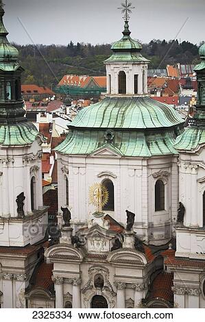 Picture - Czech Republic, Unique architecture of building with statues on the ledges; Prague. Fotosearch