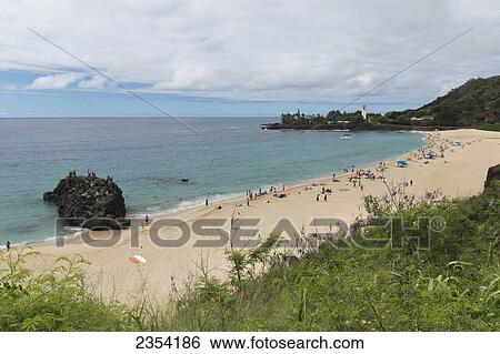 Stock Photograph - Da Big Rock on the beach of the North shore; Oahu, Hawaii, United States of America. Fotosearch