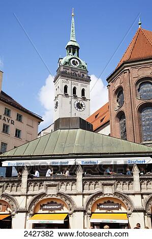 Stock Image - Daily food market and St. Peter's Church; Munich, Bayern, Germany. Fotosearch