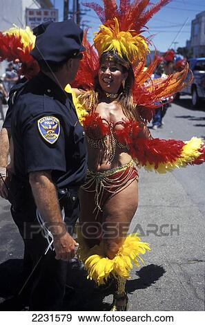 Dancer And Cop At Carnival, Mission District, San Francisco, California View Large Photo Image Stock Photo - Dancer And Cop At Carnival, Mission District, San Francisco, California. Fotosearch
