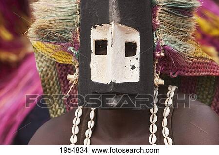 Picture - Dancer wearing Kananga mask at the Dama celebration in Tireli, Mali. Fotosearch