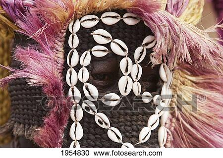 Stock Image - Dancer wearing Kananga mask at the Dama celebration in Tireli, Mali. Fotosearch