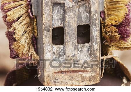 Stock Image - Dancer wearing Kananga mask at the Dama celebration in Tireli, Mali. Fotosearch