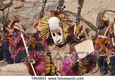 Dancers wearing Kananga masks perform at the Dama celebration in Tireli, Mali View Large Photo Image Stock Image - Dancers wearing Kananga masks perform at the Dama celebration in Tireli, Mali. Fotosearch