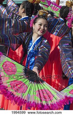 Dancers With Fans At The Chinese New Year Parade (2005, Year Of The Rooster) In Chinatown, Vancouver, British Columbia, Canada View Large Photo Image Stock Photo - Dancers With Fans At The Chinese New Year Parade (2005, Year Of The Rooster) In Chinatown, Vancouver, British Columbia, Canada. Fotosearch
