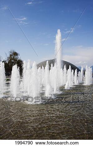 Dancing Fountain Comprised Of 70 Jets On The Plaza In Front Of The Bloedel Floral Conservatory, Triodetic Dome Capping Queen Elizabeth Park, Vancouver, British Columbia, Canada View Large Photo Image Stock Image - Dancing Fountain Comprised Of 70 Jets On The Plaza In Front Of The Bloedel Floral Conservatory, Triodetic Dome Capping Queen Elizabeth Park, Vancouver, British Columbia, Canada. Fotosearch