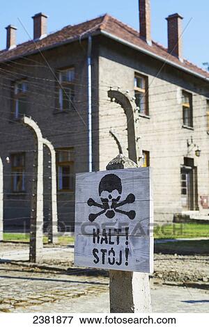 Danger sign in Auschwitz concentration camp; Osweciem, Poland View Large Photo Image Stock Photo - Danger sign in Auschwitz concentration camp; Osweciem, Poland. Fotosearch