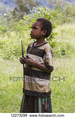 Stock Photo - Dani boy, Baliem Valley, Central Highlands of Western New Guinea, Papua, Indonesia. Fotosearch