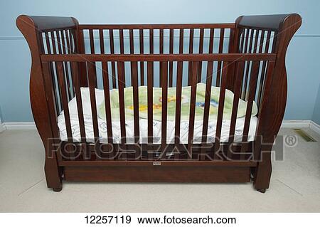dark wood bassinet