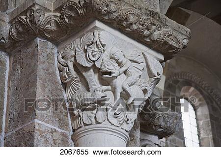 Stock Photography - David Kills A Lion Sculpted On A Romanesque Capital In The Nave Of V. Fotosearch