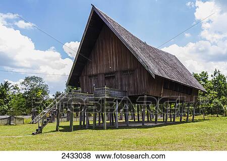 Stock Photo - Dayak Longhouse, Pangkalan Bun, Central Kalimantan, Borneo, Indonesia. Fotosearch