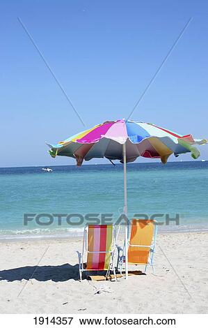 Deckchairs And Umbrella On Beach View Large Photo Image Stock Photo - Deckchairs And Umbrella On Beach. Fotosearch