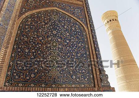 Decorated entrance to Mir-I-Arab Madrassah and Kalon minaret, Poi Kalon complex, Old Town; Bukhara, Uzbekistan View Large Photo Image Stock Photo - Decorated entrance to Mir-I-Arab Madrassah and Kalon minaret, Poi Kalon complex, Old Town; Bukhara, Uzbekistan. Fotosearch