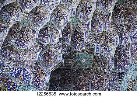 Decorated stalactites (muqarnas) within Iwan entrance to Imam Mosque, Imam Square; Isfahan, Iran View Large Photo Image Stock Photography - Decorated stalactites (muqarnas) within Iwan entrance to Imam Mosque, Imam Square; Isfahan, Iran. Fotosearch
