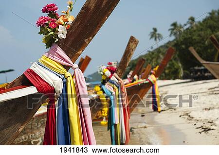 Decorations On The Bow Of Long-Tail Boats On Phi Phi Islands; Phuket Thailand View Large Photo Image Stock Image - Decorations On The Bow Of Long-Tail Boats On Phi Phi Islands; Phuket Thailand. Fotosearch