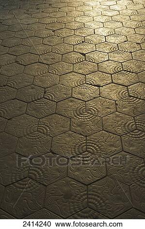 Stock Image - Decorative design on the blocks of a path; Barcelona, Spain. Fotosearch