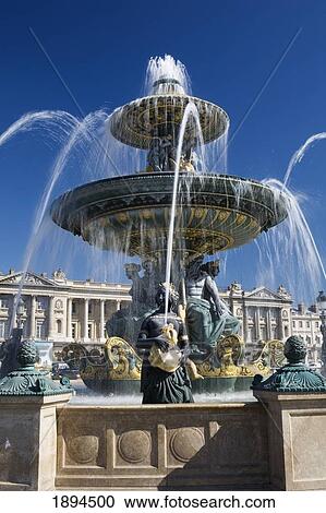 Stock Image - Decorative Maritime Fountain And Blue Sky At The Place De La Concorde; Paris, France. Fotosearch