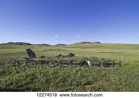Stock Photo - Deer Stones and ancient graves, Khogno Khan Uul Nature Reserve, Arkhangai Province, Mongolia. Fotosearch