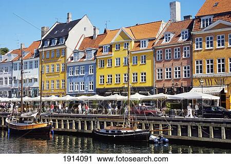 Stock Image - Denmark, Building in Nyhavn by Canal; Copenhagen. Fotosearch