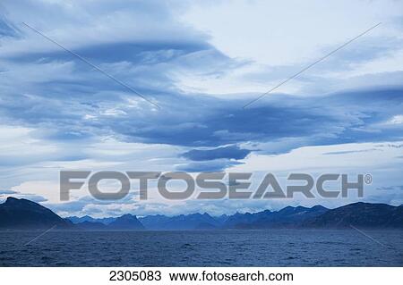 Stock Image - Denmark, Coastal scenery on west coast; Greenland. Fotosearch