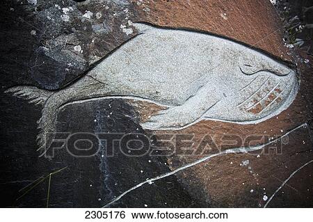Stock Photograph - Denmark, Greenland, Whale carvings on rocks; Qaqortoq (Julianehab). Fotosearch