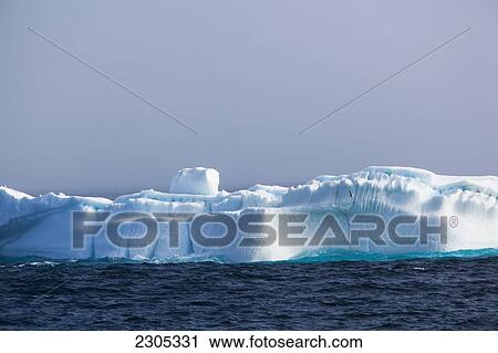 Stock Image - Denmark, Iceberg on west coast; Greenland. Fotosearch