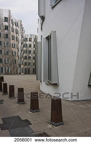 Stock Image - Der Neue Zollhof Office Buildings, Designed By Architect Frank O. Gehry, In Media Harbor, Dusseldorf, North Rhine-Westphalia, Germany. Fotosearch