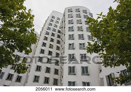 Stock Image - Der Neue Zollhof Office Buildings, Designed By Architect Frank O. Gehry, In Media Harbor, Dusseldorf, North Rhine-Westphalia, Germany. Fotosearch