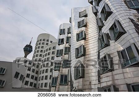 Stock Photo - Der Neue Zollhof Office Buildings, Designed By Architect Frank O. Gehry, In Media Harbor, Dusseldorf, North Rhine-Westphalia, Germany. Fotosearch