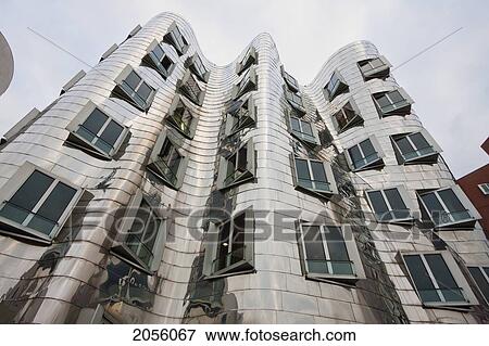 Stock Photo - Der Neue Zollhof Office Buildings, Designed By Architect Frank O. Gehry, In Media Harbor, Dusseldorf, North Rhine-Westphalia, Germany. Fotosearch