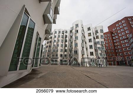 Stock Photo - Der Neue Zollhof Office Buildings, Designed By Architect Frank O. Gehry, In Media Harbor, Dusseldorf, North Rhine-Westphalia, Germany. Fotosearch