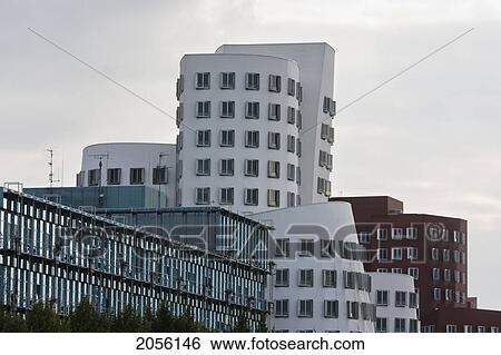 Stock Photograph - Der Neue Zollhof Office Buildings, Designed By Architect Frank O. Gehry, In Media Harbor, Dusseldorf, North Rhine-Westphalia, Germany. Fotosearch