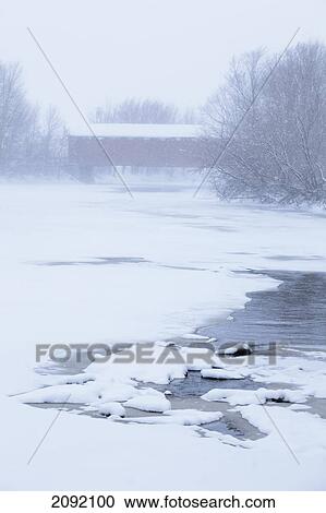 Stock Image - Des Riviere Covered Bridge Over Brochets River; Notre-Dame-De-Stanbridge Quebec Canada. Fotosearch