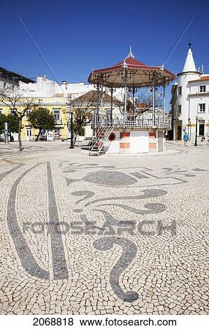 Stock Photo - Designs In The Tiled Ground In The Town Square; Faro Algarve Portugal. Fotosearch