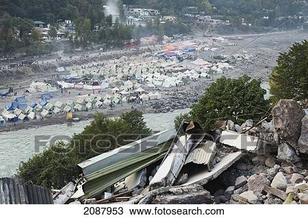 Destroyed Building And Tents In A Relief Camp After The 8 October 2005 Earthquake, Muzaffarabad, Azad Kashmir, Pakistan View Large Photo Image Stock Image - Destroyed Building And Tents In A Relief Camp After The 8 October 2005 Earthquake, Muzaffarabad, Azad Kashmir, Pakistan. Fotosearch