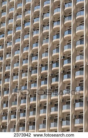 Stock Image - Detail of apartment building; Dubai, United Arab Emirates. Fotosearch