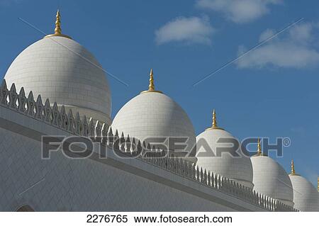 Stock Photography - Detail of domes surrounding the courtyard of the Sheikh Zayed Grand Mosque; Abu Dhabi, United Arab Emirates. Fotosearch