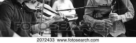 Detail Of Fiddler, And Low-Land Scottish Pipe Players, Halifax, Nova Scotia, B/W View Large Photo Image Stock Image - Detail Of Fiddler, And Low-Land Scottish Pipe Players, Halifax, Nova Scotia, B/W. Fotosearch