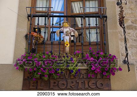 Stock Photography - Detail Of Flowers And Scarecrow In Laguardia, Basque Country, Spain. Fotosearch