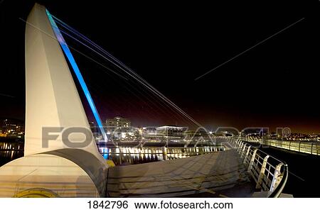 Stock Photograph - Detail Of Futuristic Illuminated Bridge At Night; Gateshead, Northumberland, England. Fotosearch