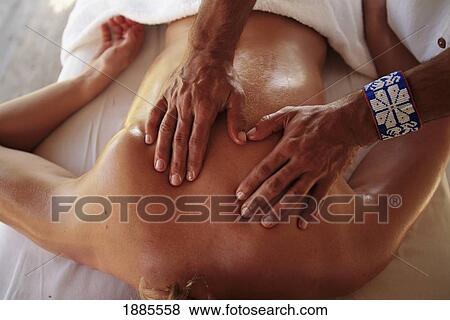 Stock Photo - Detail Of Hands Massaging A Woman's Back, Spa, South Of Puerto Vallarta. Fotosearch