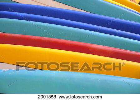Stock Photo - Detail Of Many Different Colored Surfboards, Straight Up. Fotosearch